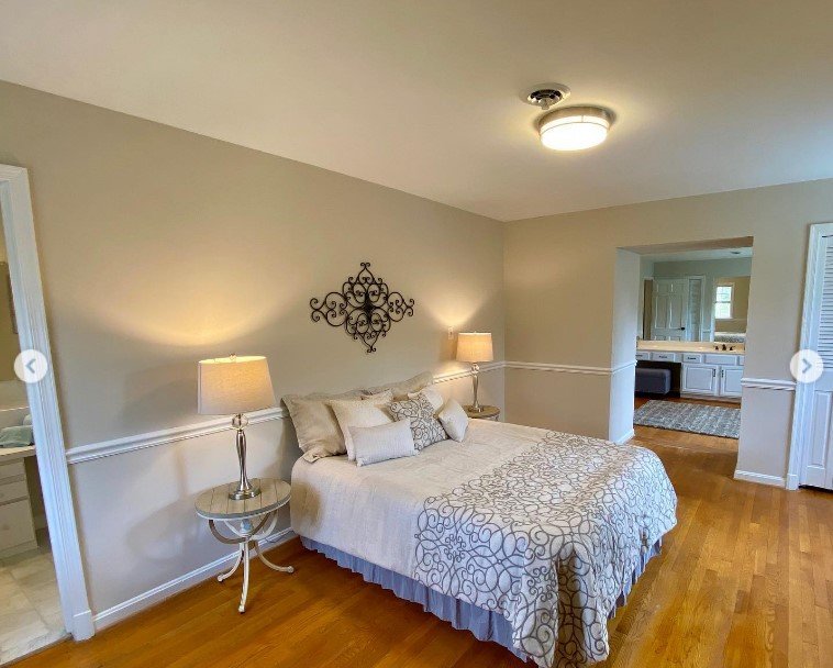 Finished bedroom with lighting