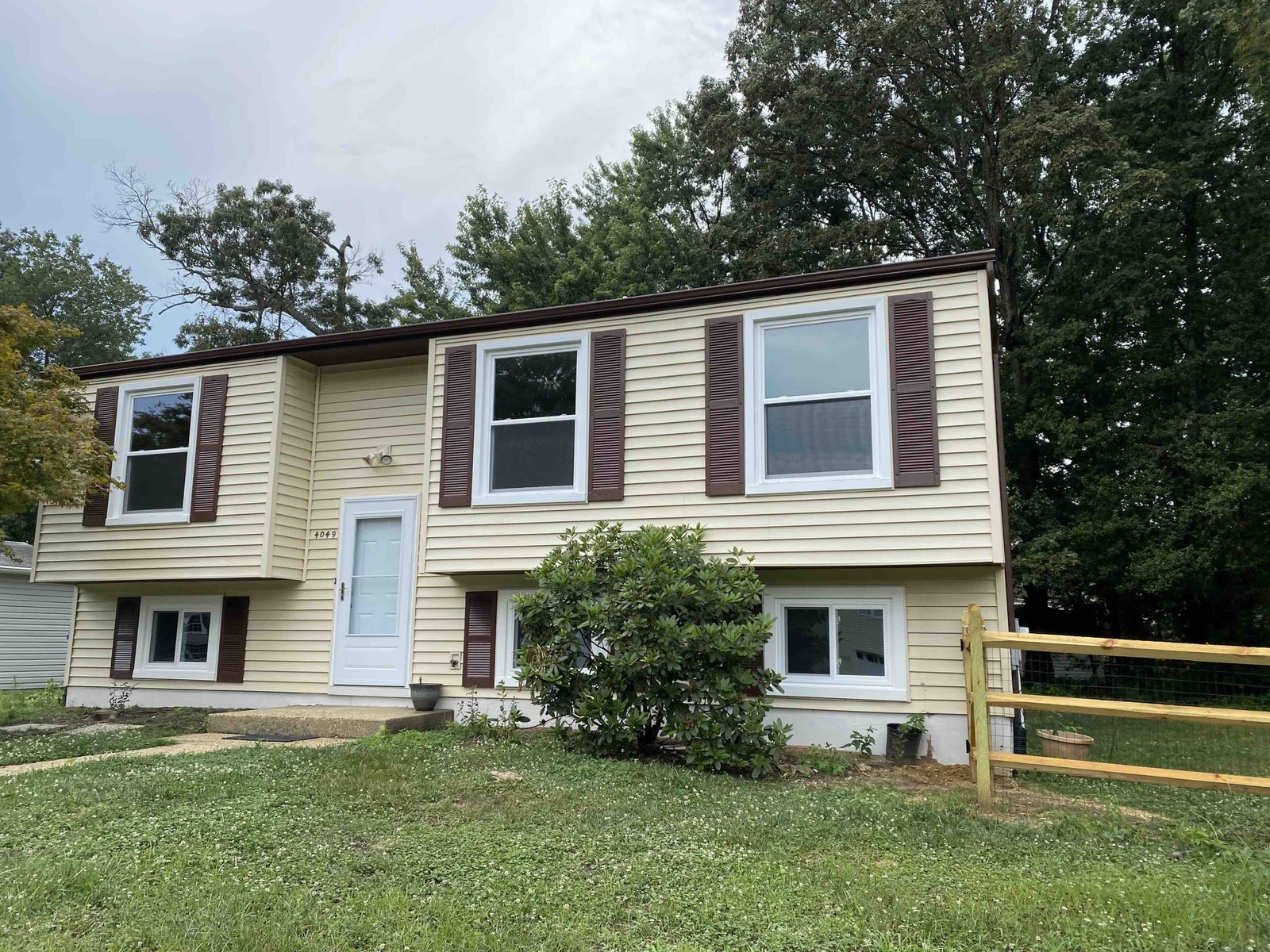 Exterior view of remodeled house with new windows