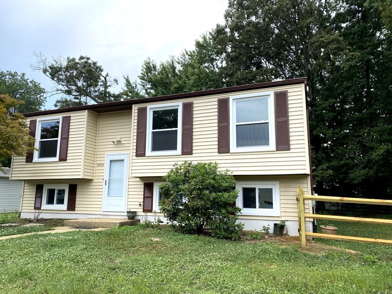 Exterior view of remodeled house with new windows